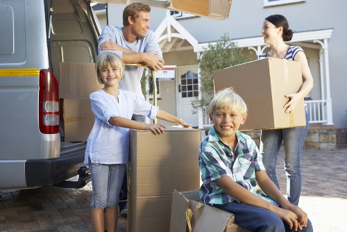 Expert packers securely preparing items in Brixton